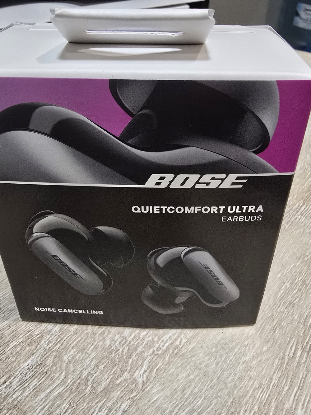 Bose QuietComfort Ultra Earbuds in Black and Purple Accent